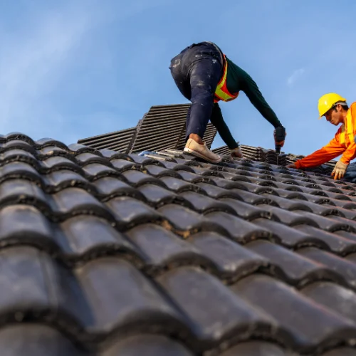Image of work fixing a tiled roof in Great Yarmouth